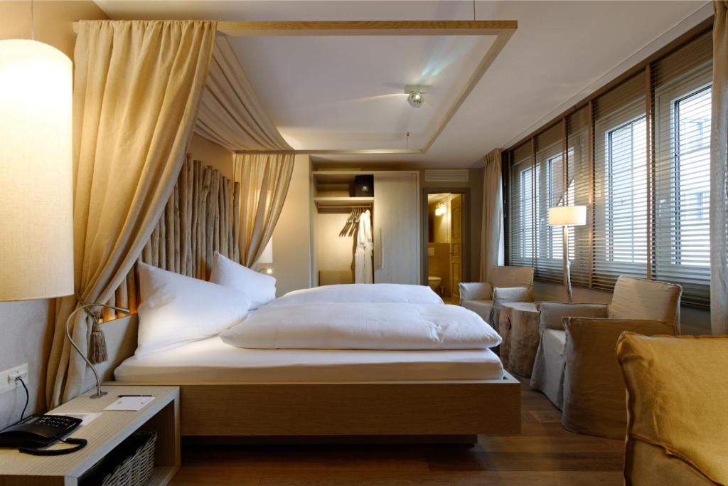 Postel nebo postele na pokoji v ubytování Seerose Resort & Spa