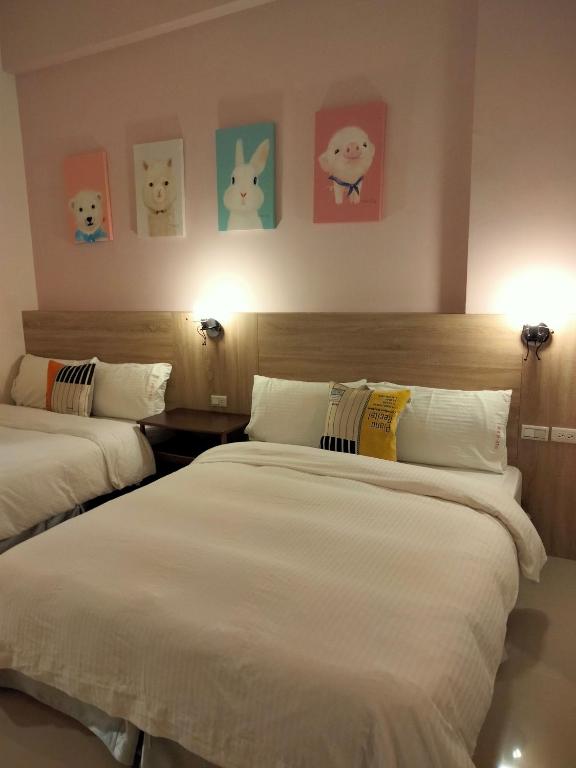 Postel nebo postele na pokoji v ubytování 910 Hostel (Chengdong)