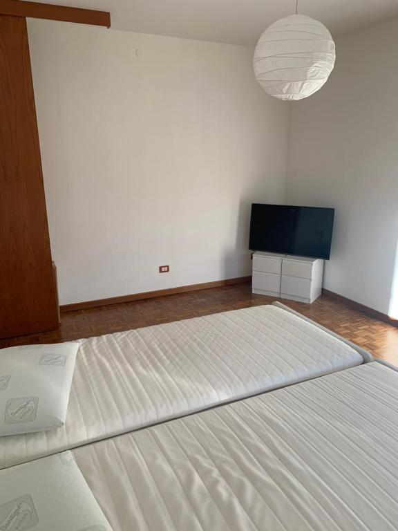 Postel nebo postele na pokoji v ubytování Cormons Bellissima