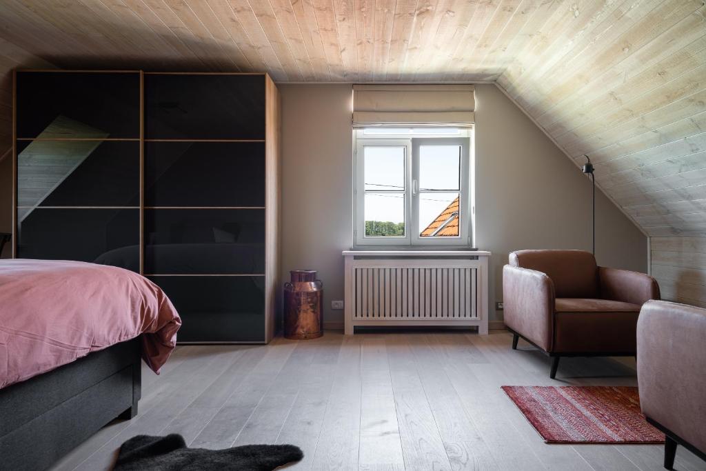 Posezení v ubytování B&B De Hemelse Polder