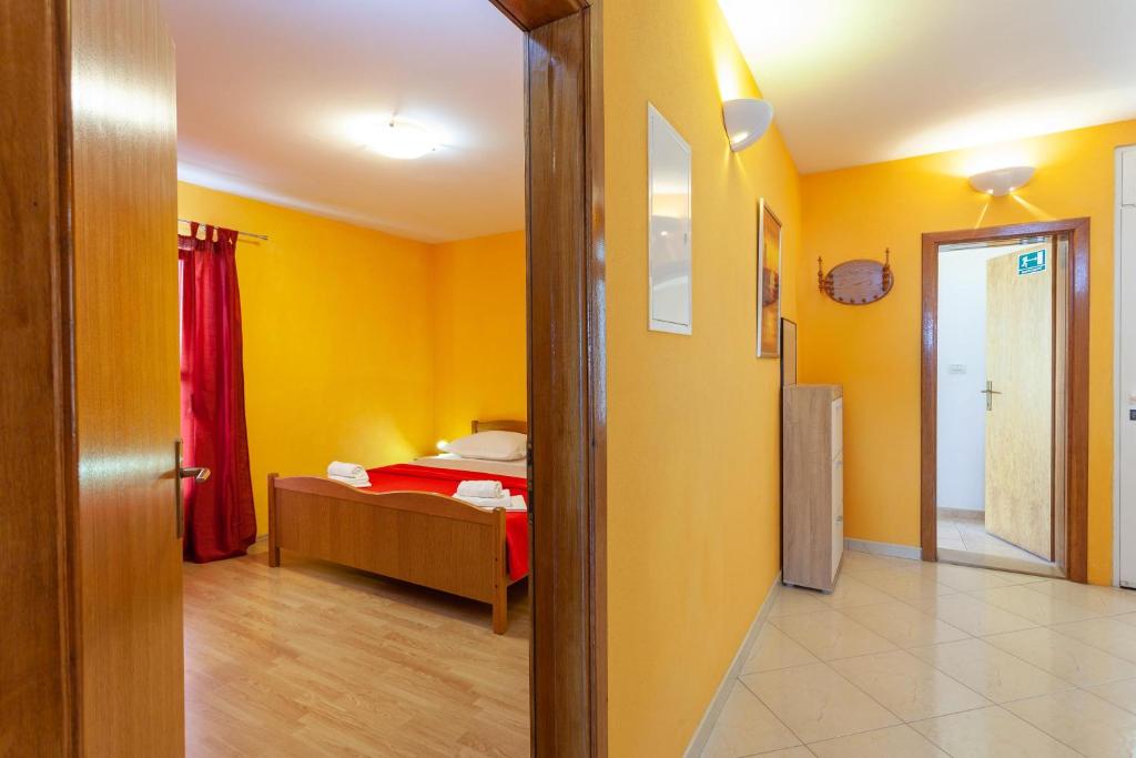 Posteľ alebo postele v izbe v ubytovaní Apartman Prlić 3