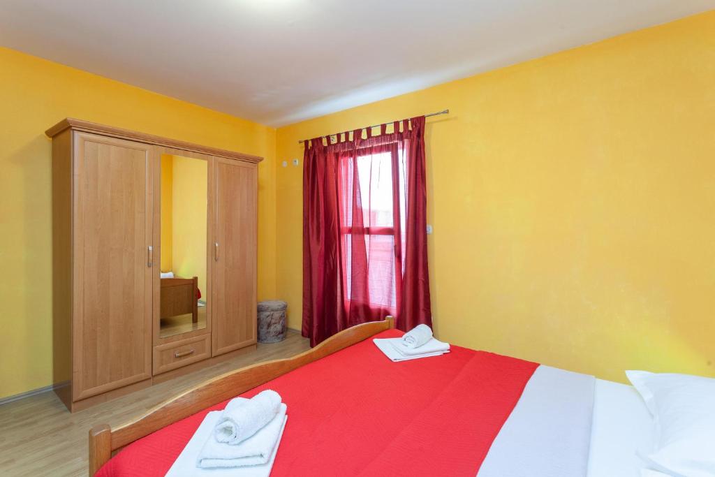 Posteľ alebo postele v izbe v ubytovaní Apartman Prlić 3