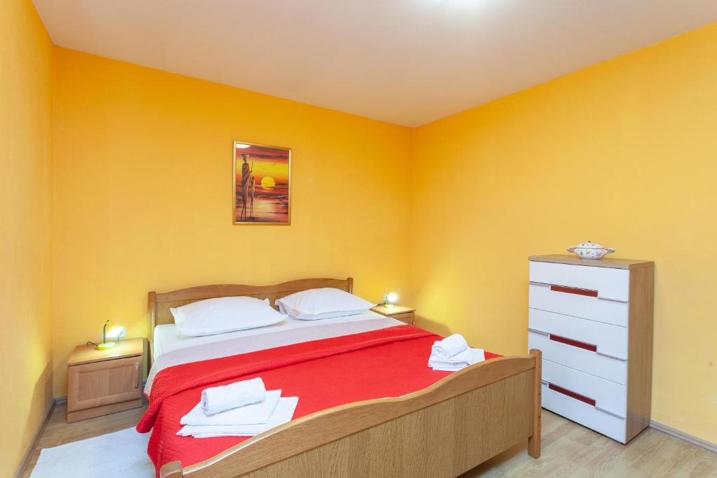 Posteľ alebo postele v izbe v ubytovaní Apartman Prlić 3