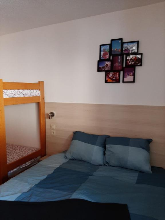 Postel nebo postele na pokoji v ubytování Hotel Chalet du Crey
