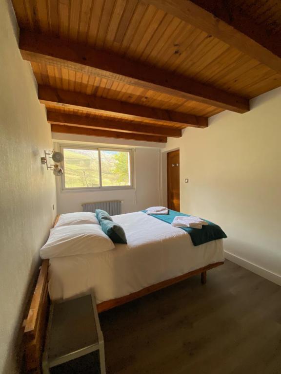 Postel nebo postele na pokoji v ubytování Hotel Le Chalet