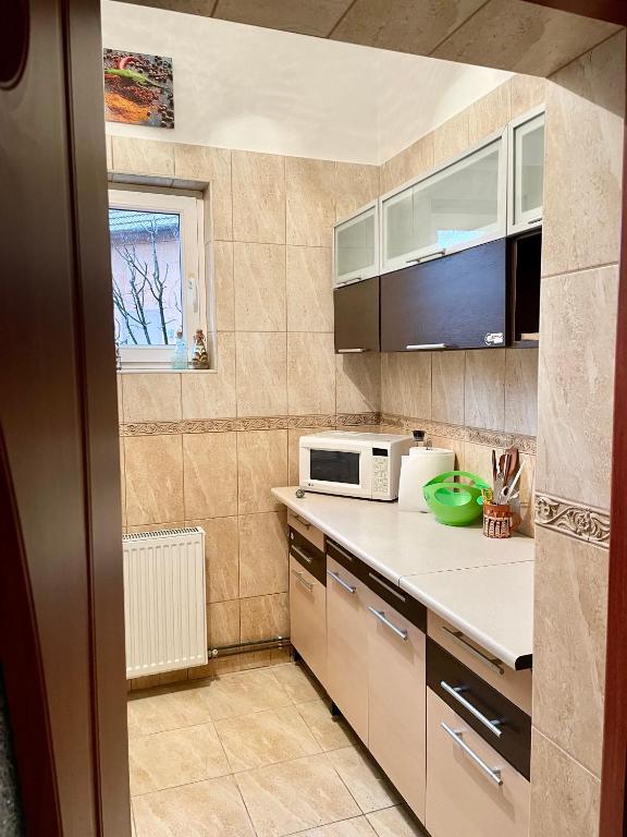 Kuchyň nebo kuchyňský kout v ubytování Mosaico Alfetta Hostel
