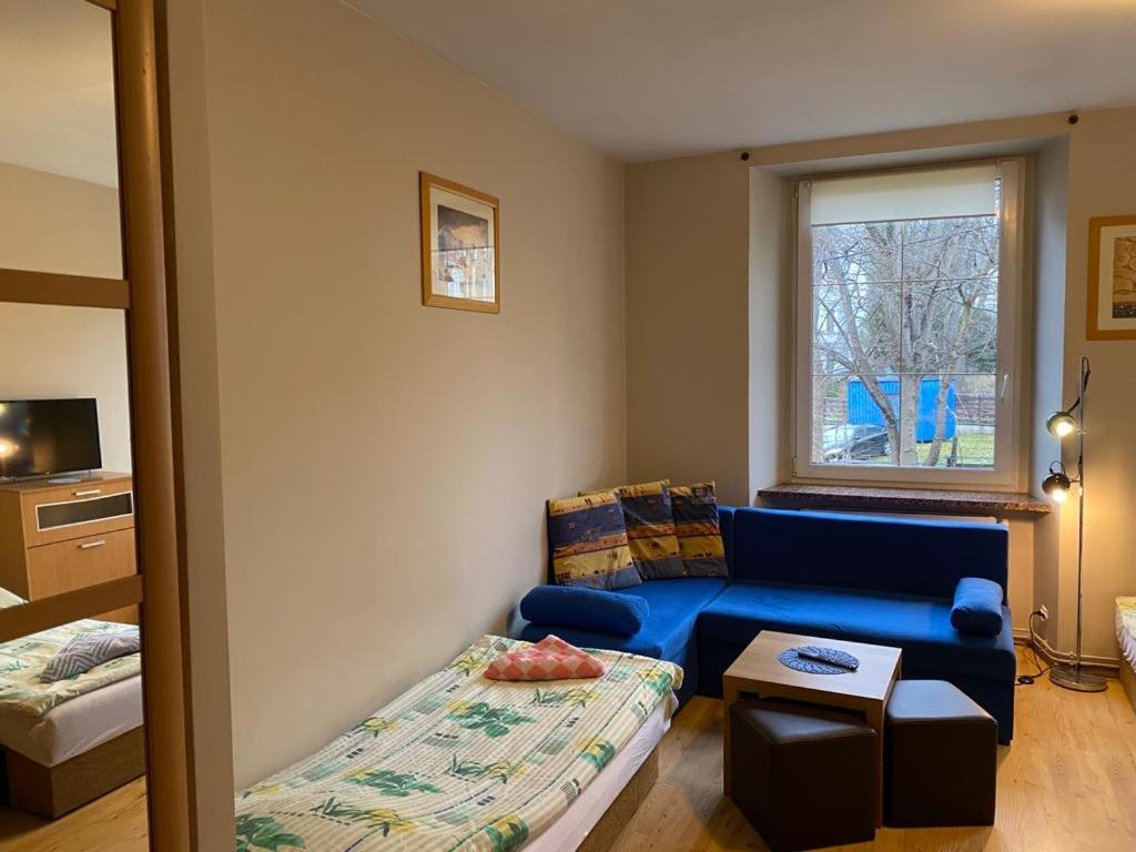 Posteľ alebo postele v izbe v ubytovaní Apartamenty pokoje "MARIA"
