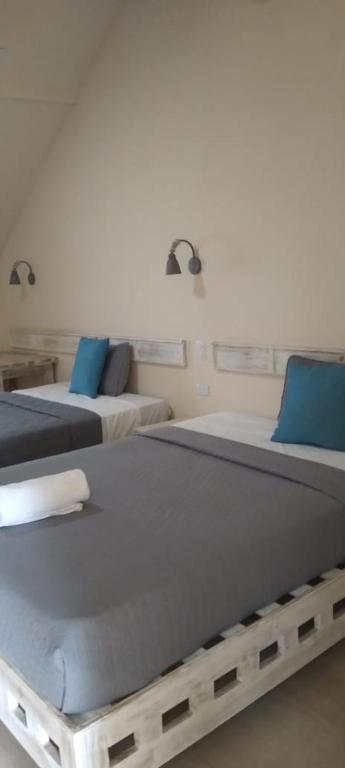 Katil atau katil-katil dalam bilik di guest house MY WAY