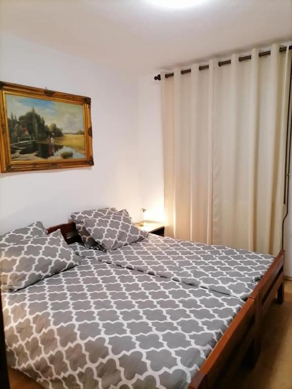 Posteľ alebo postele v izbe v ubytovaní Apartmani Marina Poreč