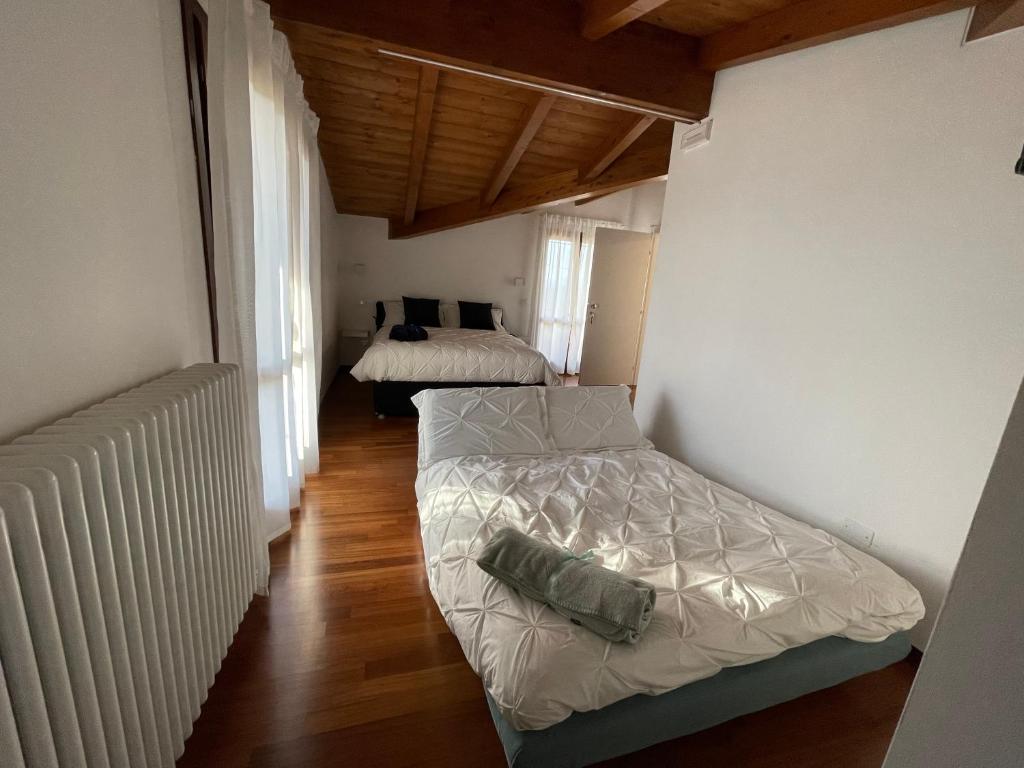 Postel nebo postele na pokoji v ubytování B&B DA NONNA ANACLE