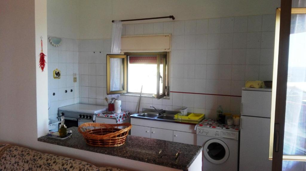 A kitchen or kitchenette at Fronte del Porto
