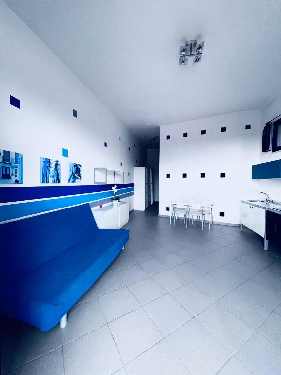 a large room with a ping pong table in it at Casa Serra in Porto Palo