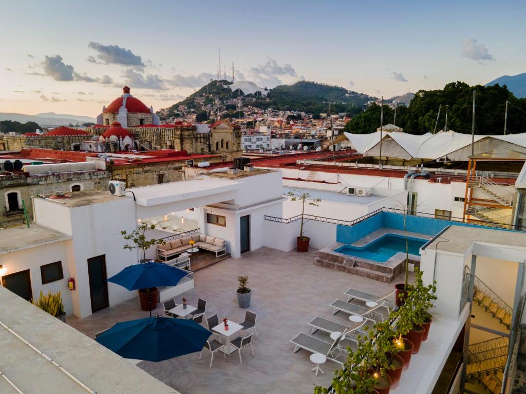 a view of the rooftop of a building with a pool at Suites de La Parra in Oaxaca City