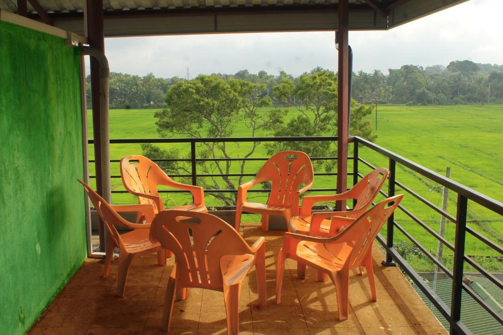Balkón nebo terasa v ubytování Sigiriya Water Guest & View Point Restaurant