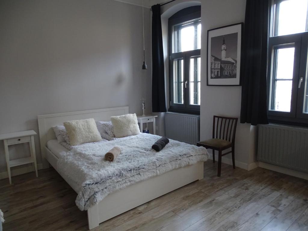 Posteľ alebo postele v izbe v ubytovaní Óváros Apartman