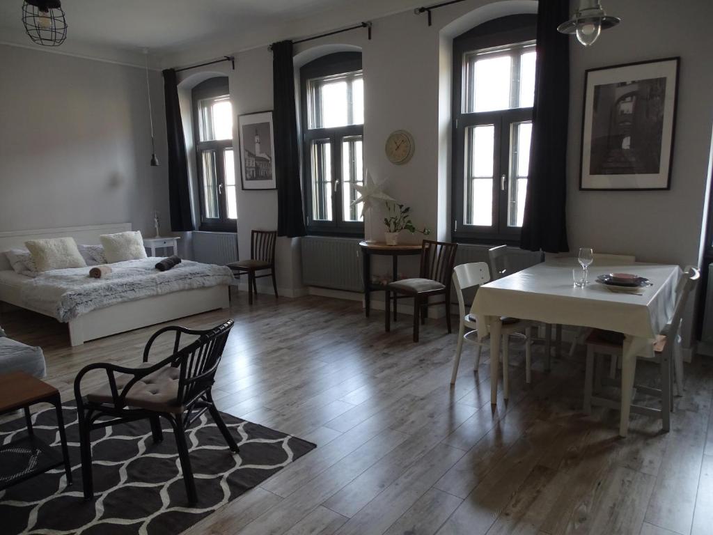 Posteľ alebo postele v izbe v ubytovaní Óváros Apartman