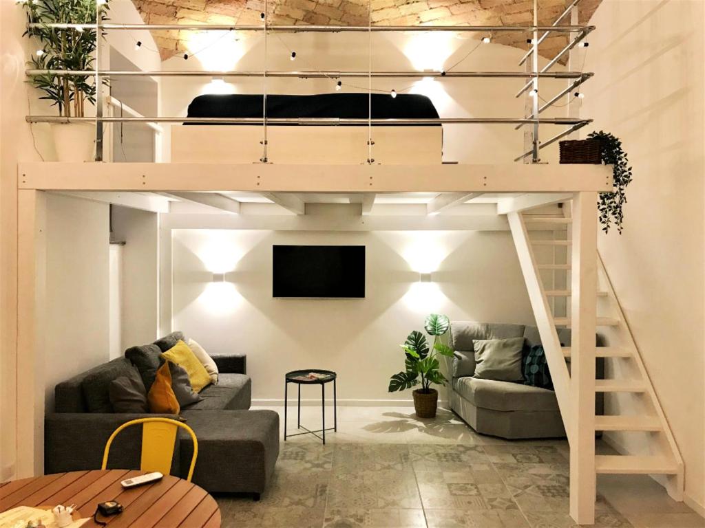 Posedenie v ubytovaní Beautifully Renovated Loft in Trastevere