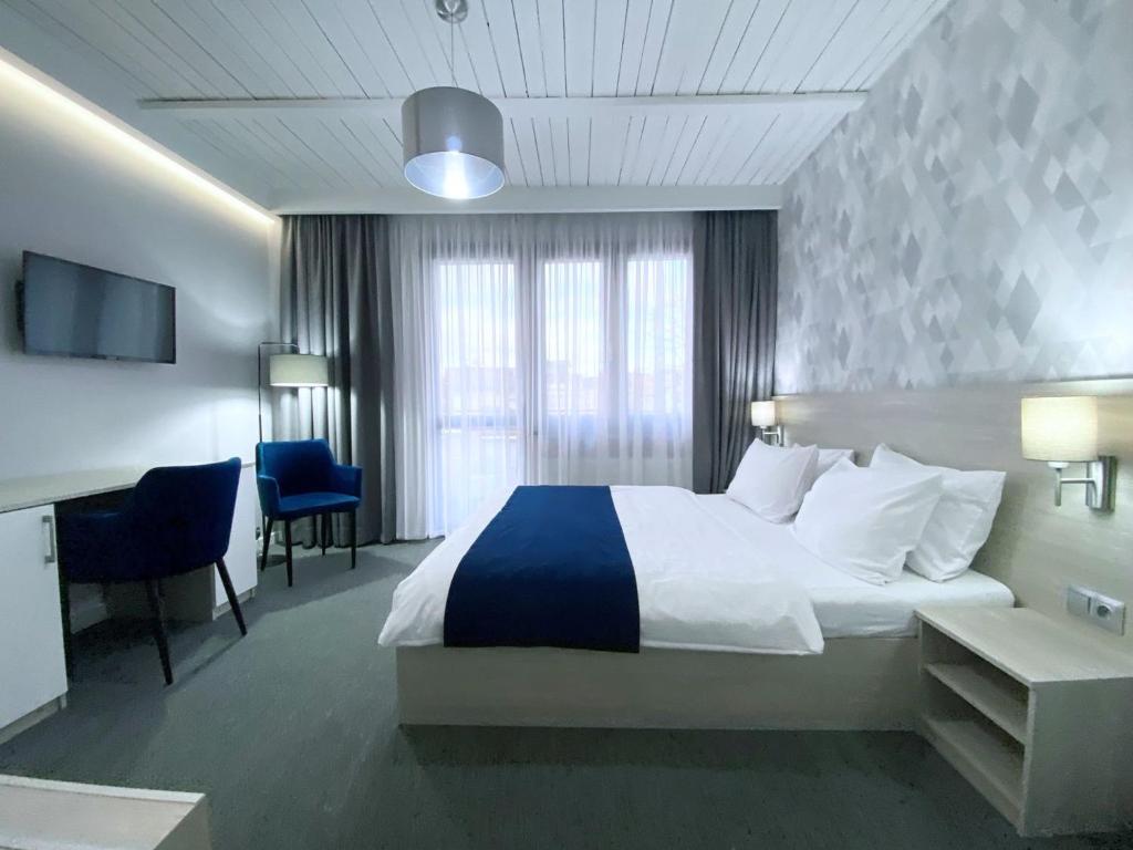 Postel nebo postele na pokoji v ubytování Willa Lazur ADULTS ONLY