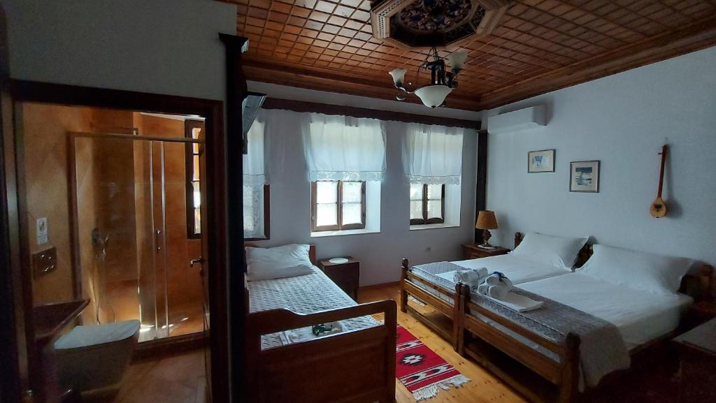 Postel nebo postele na pokoji v ubytování Timo's Guest House