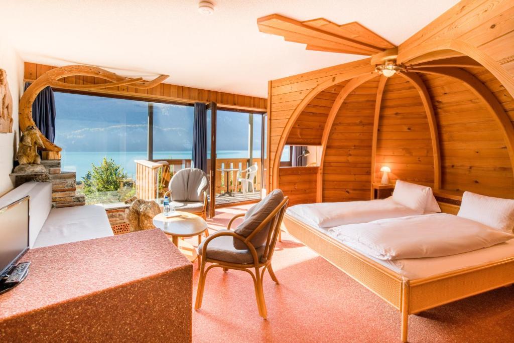 Кровать или кровати в номере Hotel Lindenhof by Crossworld AG