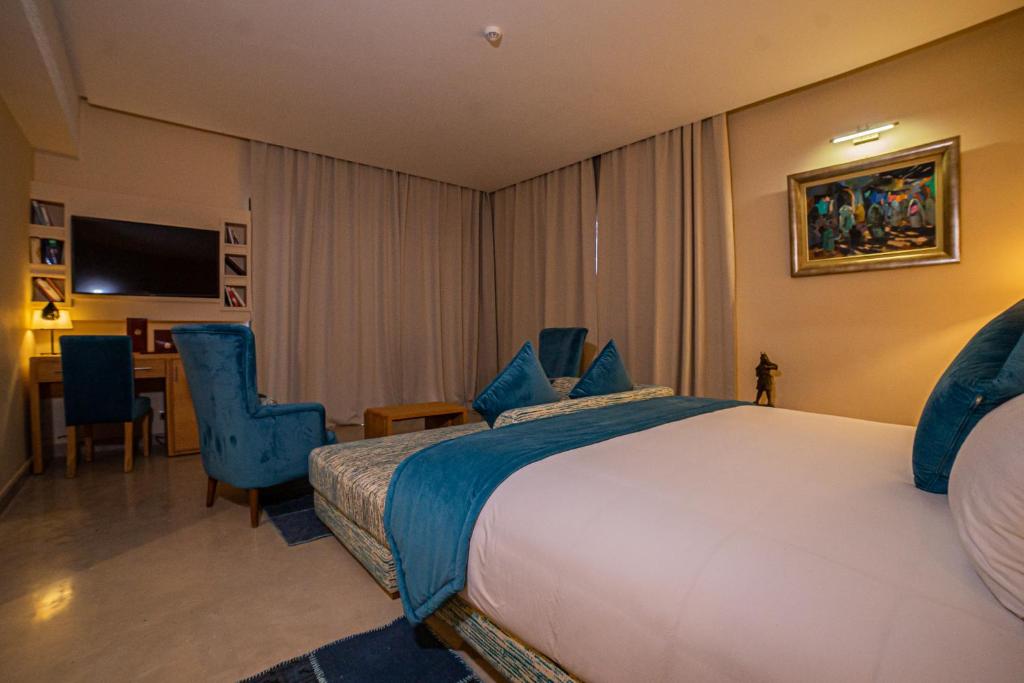 TV a/nebo společenská místnost v ubytování SUMAHAN SUITES & SPA