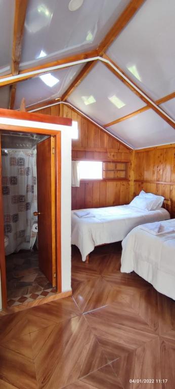 Postel nebo postele na pokoji v ubytování Cabañas La Campiña Ubalá