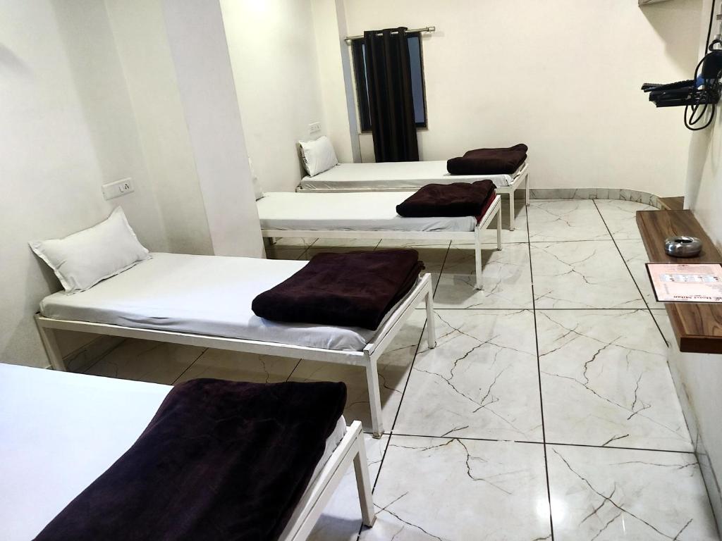 Postel nebo postele na pokoji v ubytování Hotel Milan