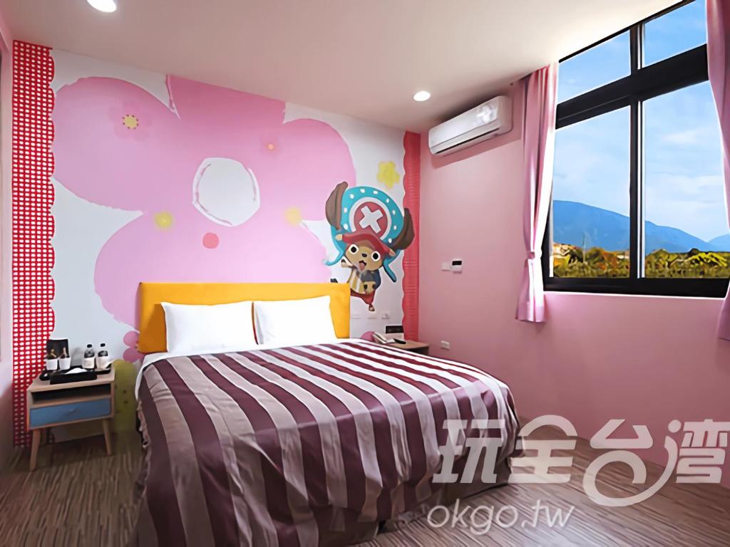Postel nebo postele na pokoji v ubytování CoCo Motel Boutique