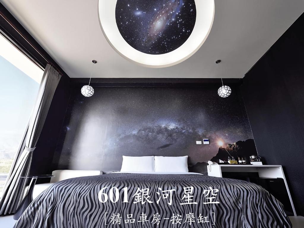 Postel nebo postele na pokoji v ubytování CoCo Motel Boutique