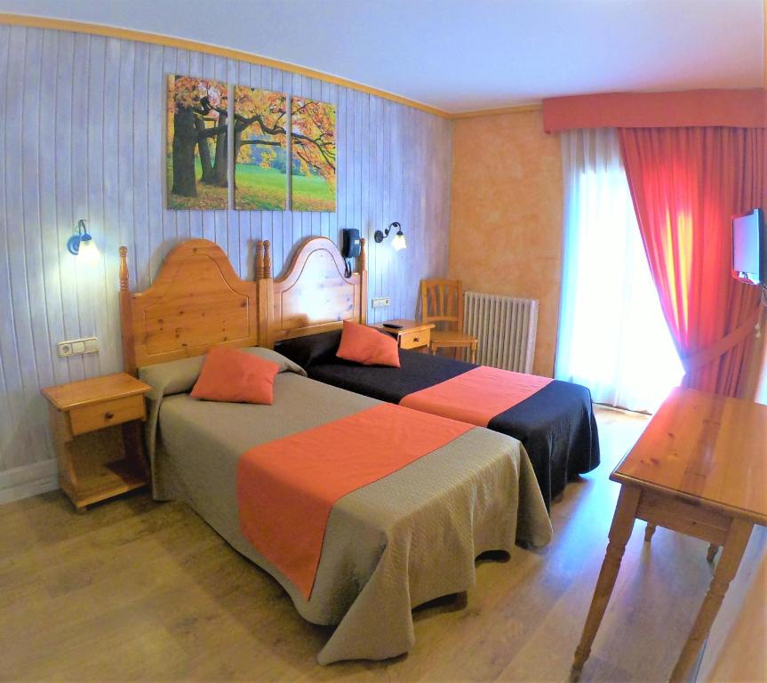 Postel nebo postele na pokoji v ubytování Sorrosal