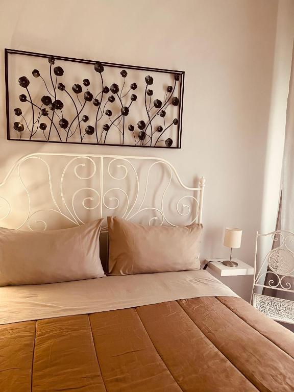 Postel nebo postele na pokoji v ubytování B&B Meliora Rooms