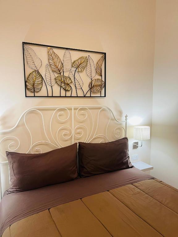Postel nebo postele na pokoji v ubytování B&B Meliora Rooms