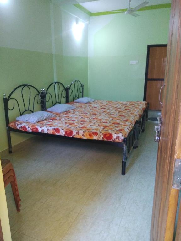 Postel nebo postele na pokoji v ubytování Luiza Guest House