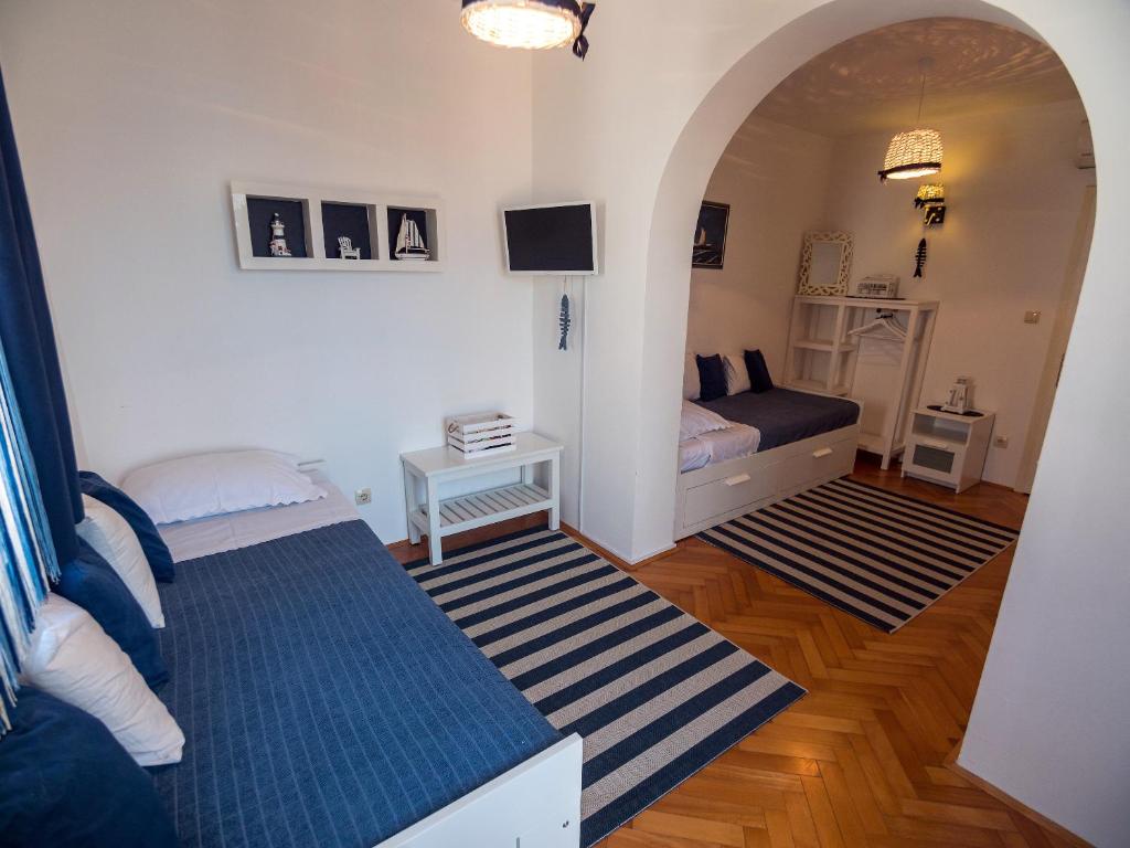 Postel nebo postele na pokoji v ubytování Villa Ana