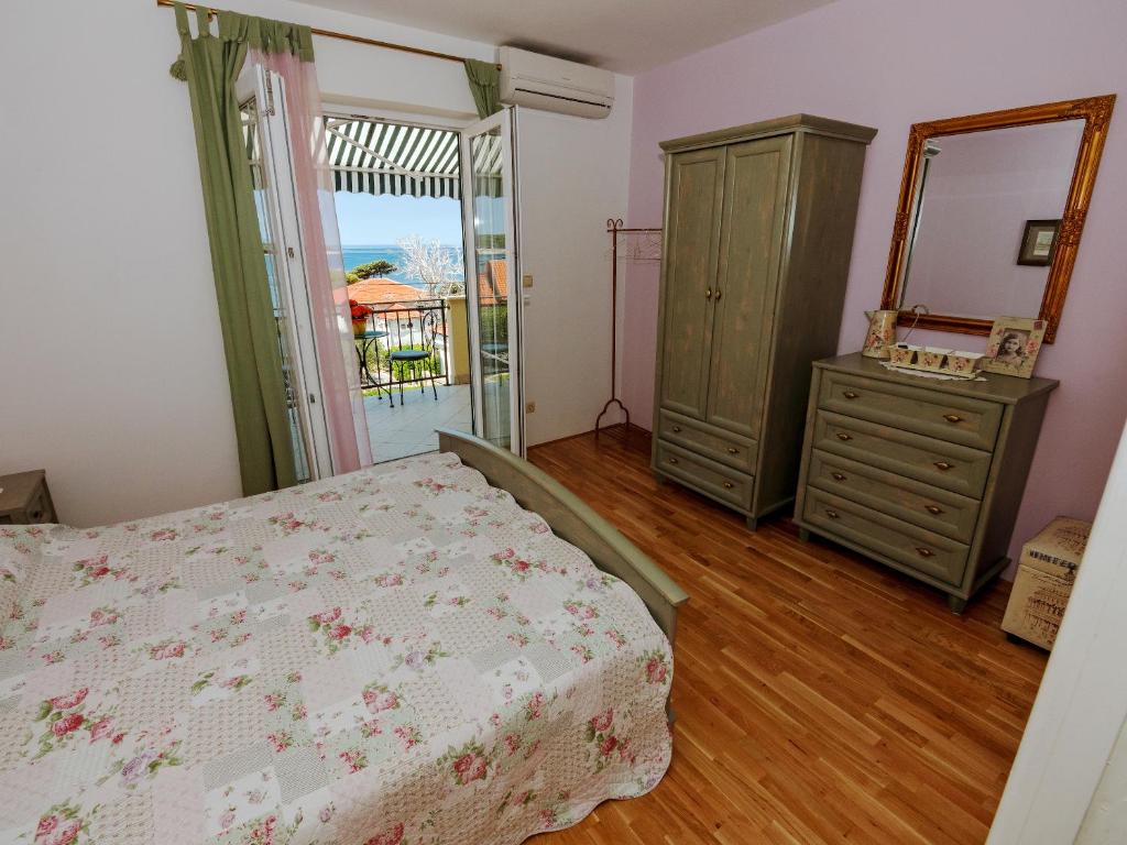 Postel nebo postele na pokoji v ubytování Villa Ana