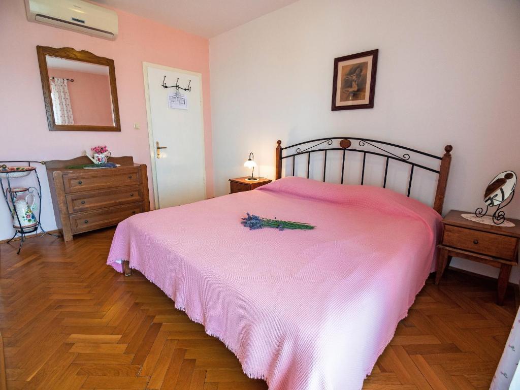 Postel nebo postele na pokoji v ubytování Villa Ana