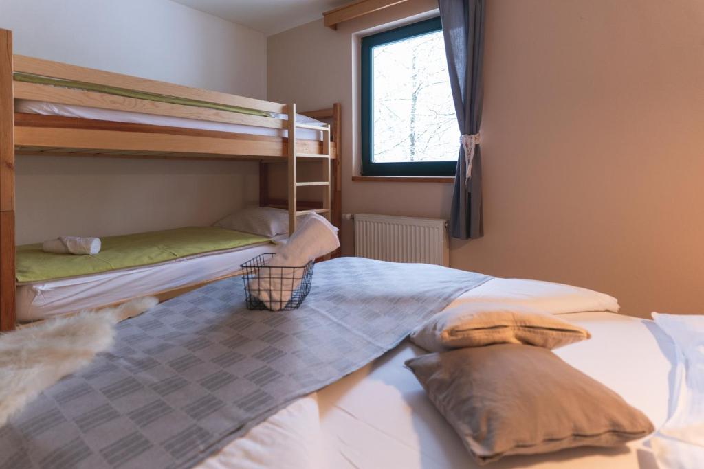 Postel nebo postele na pokoji v ubytování Brunarica
