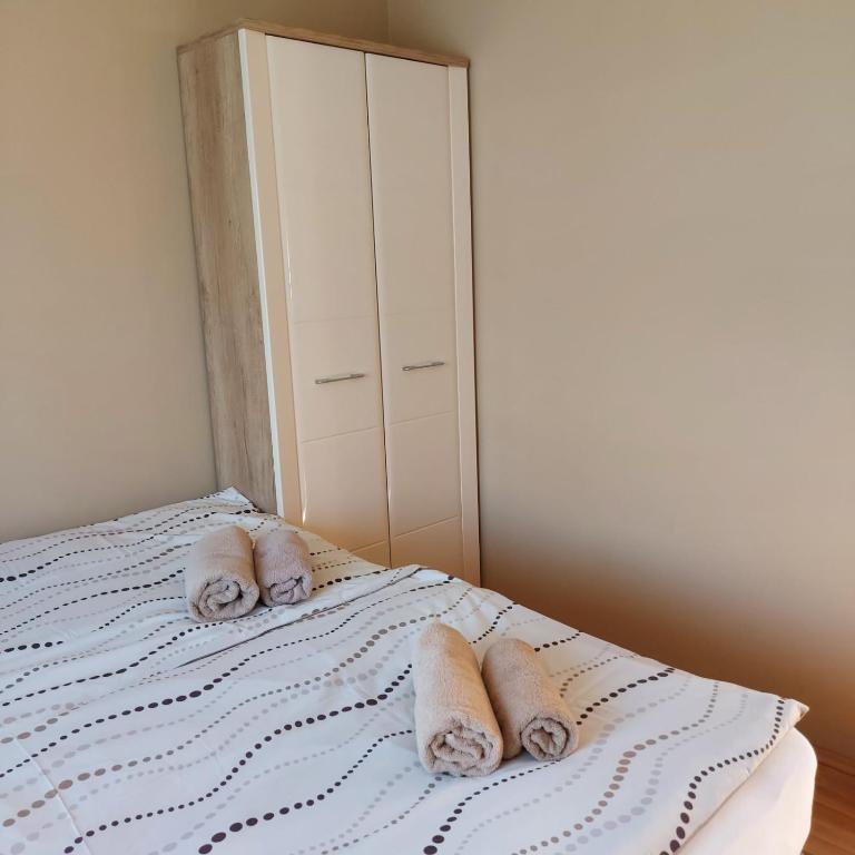 Postel nebo postele na pokoji v ubytování Mediterrán Vendégház