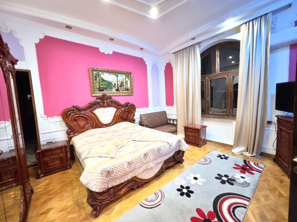 Postel nebo postele na pokoji v ubytování Hotel Royal