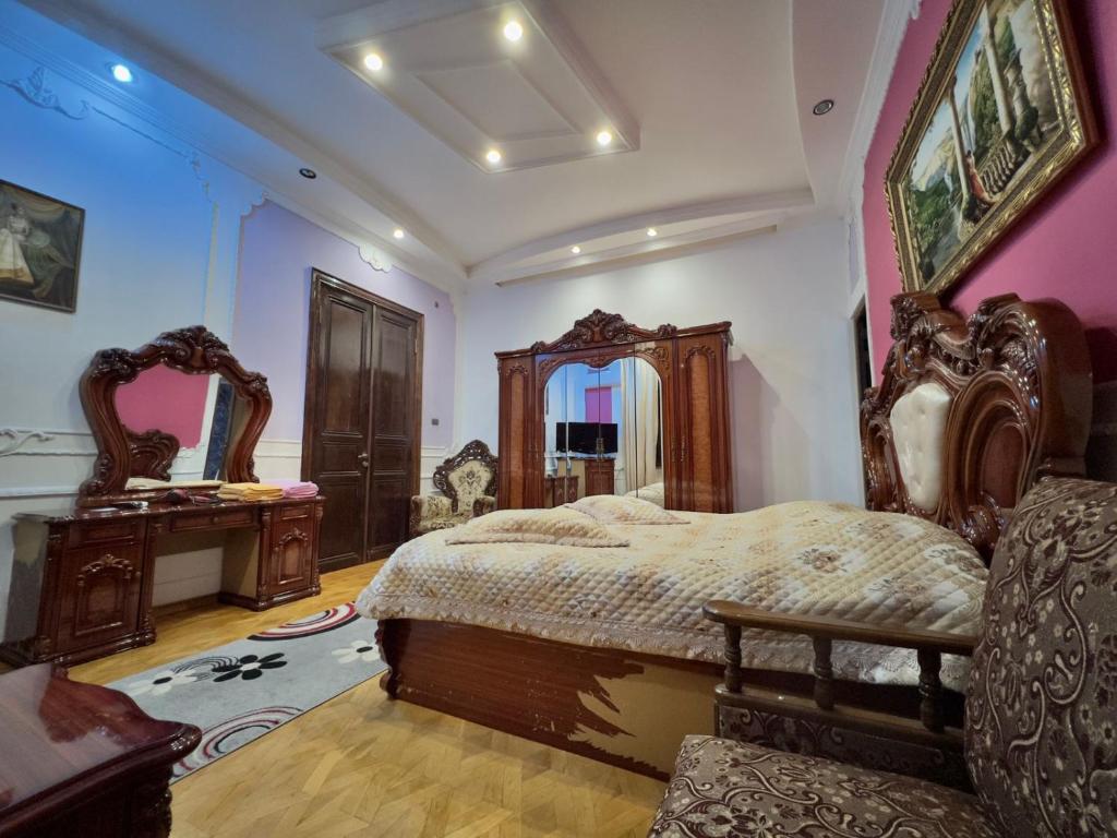 Postel nebo postele na pokoji v ubytování Hotel Royal