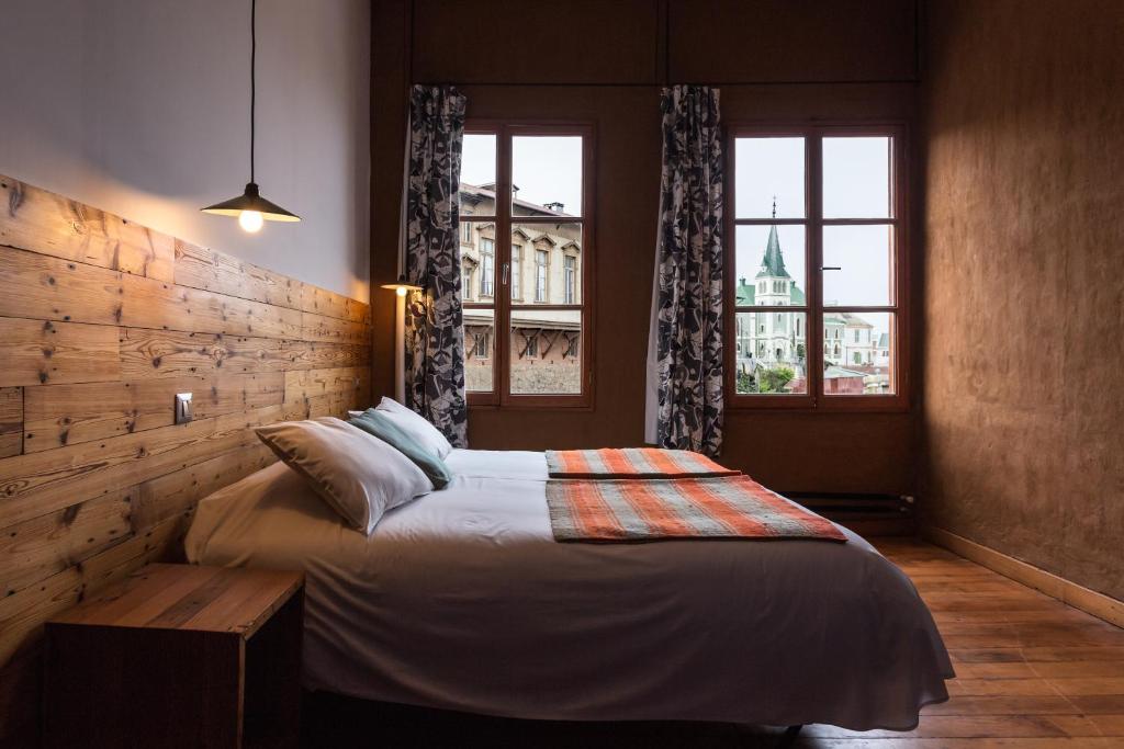 Postel nebo postele na pokoji v ubytování Fauna Hotel