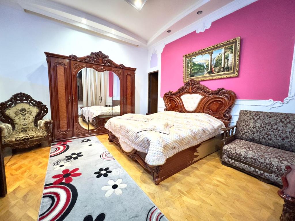 Postel nebo postele na pokoji v ubytování Hotel Royal