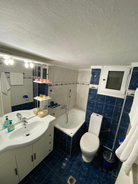 A bathroom at Beautiful apartment in the center of Thessaloniki
