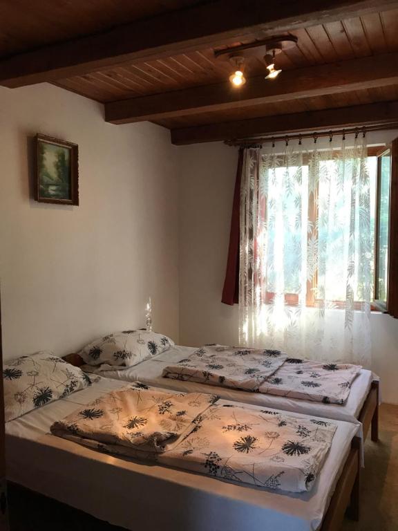 Postel nebo postele na pokoji v ubytování Vénusz Üdülőcentrum