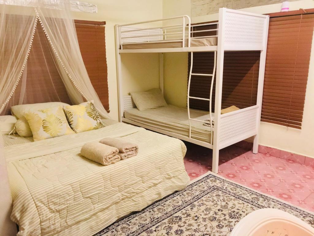 Postel nebo postele na pokoji v ubytování Dar Yasmine Motel