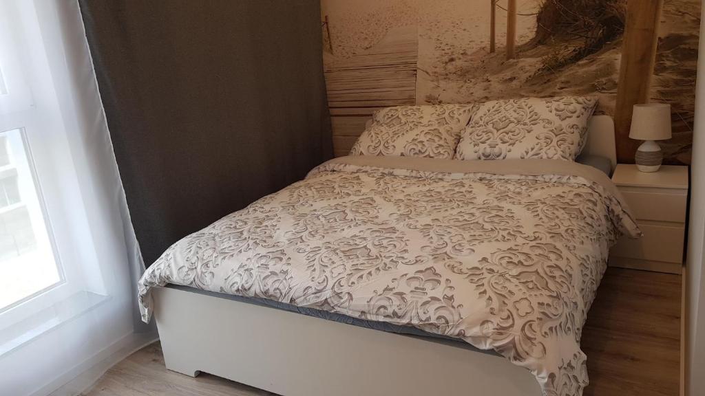 Posteľ alebo postele v izbe v ubytovaní Apartamenty Gdańsk Angielska Grobla