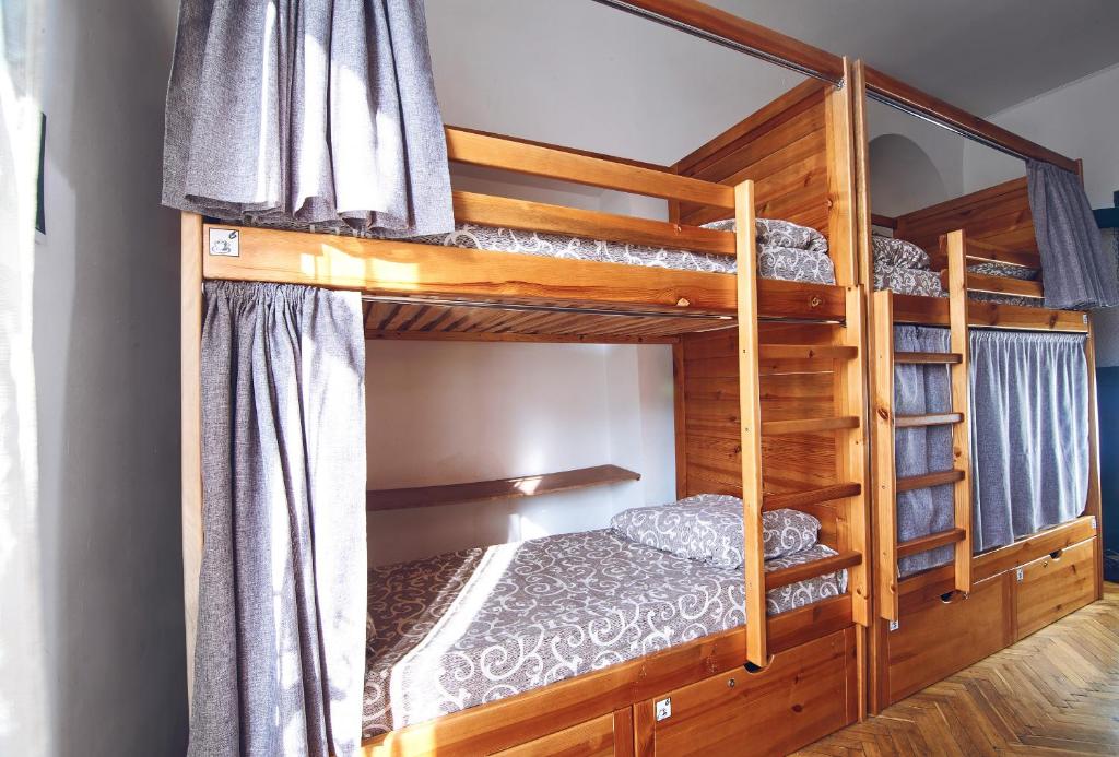 Postel nebo postele na pokoji v ubytování Coffee Home Hostel