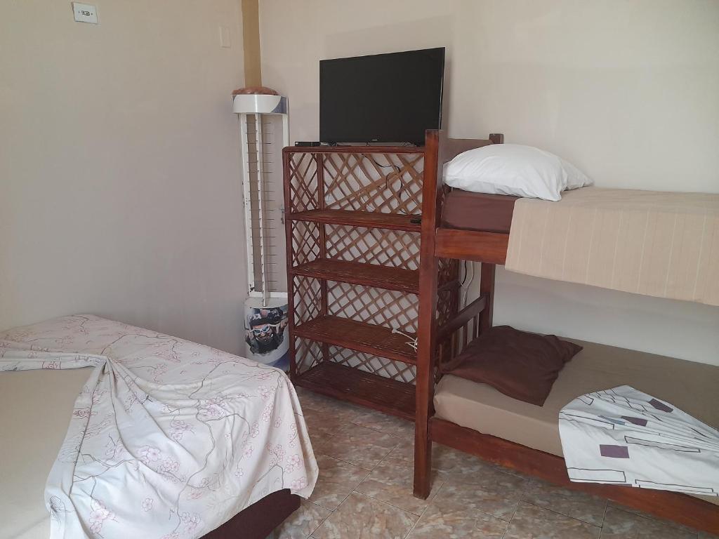 Кровать или кровати в номере Apartamento Avarandado Morro De São Paulo Á 50 mts da areia da 2''praia