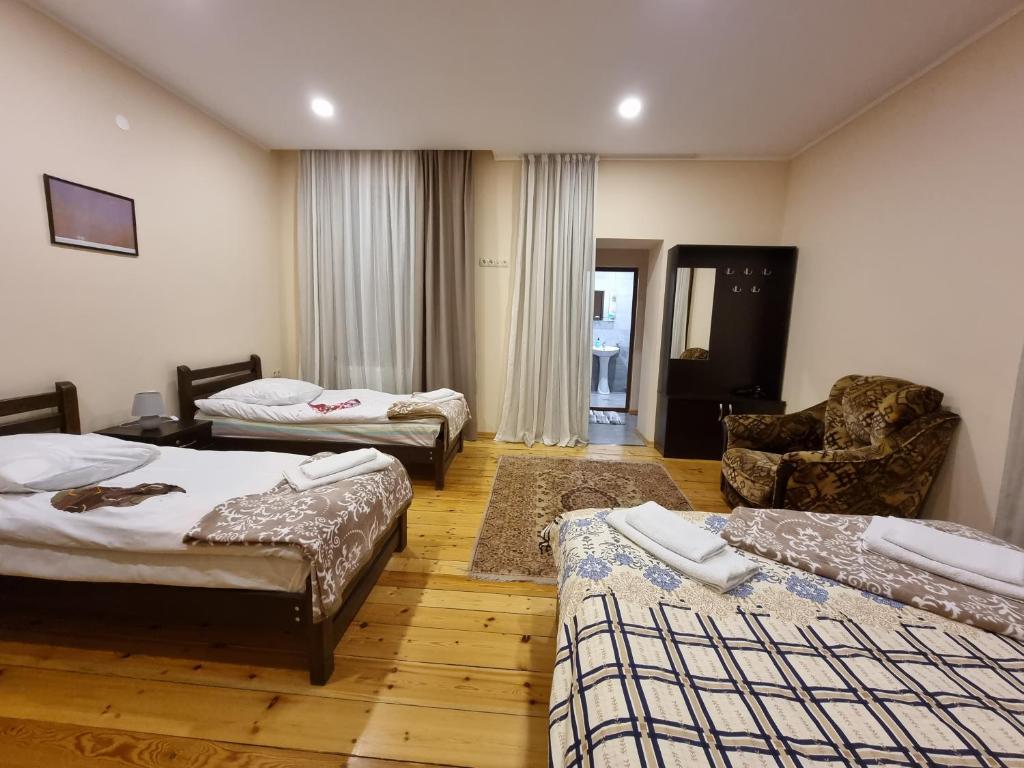 Postel nebo postele na pokoji v ubytování Shorena & Nino