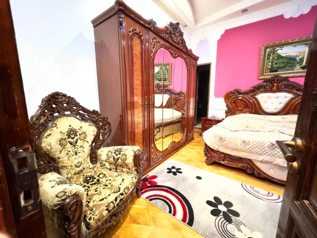 Postel nebo postele na pokoji v ubytování Hotel Royal